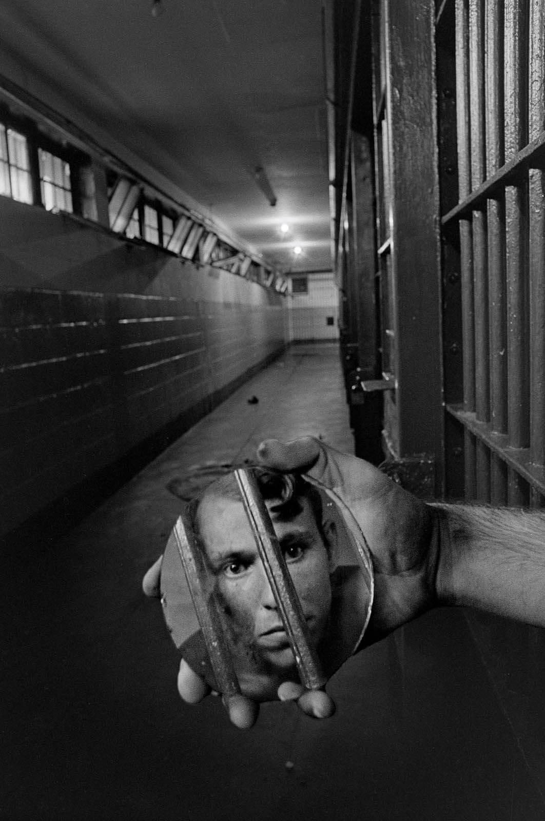 Prisoner with mirror - Sean Kernan